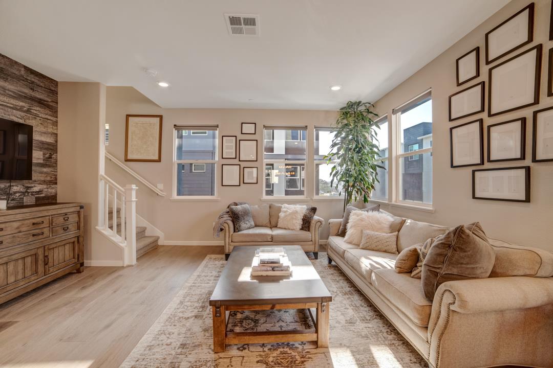 611 Clover Circle Milpitas, CA 95035 - Photo 15 of 30 a living room with furniture and a flat screen tv