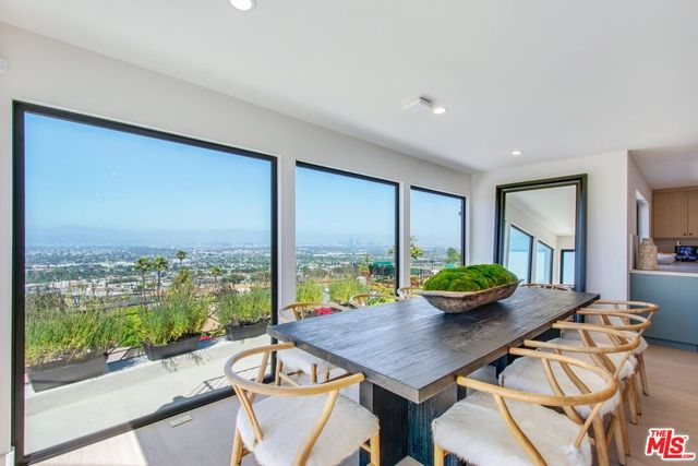 a bedroom with a large bed and a couch