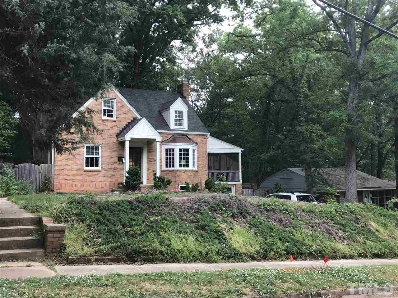 3212 Ruffin Street Raleigh, NC 27607 - Photo 3 of 3 a front view of a house with a yard