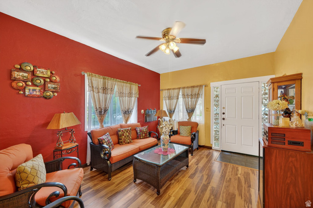 977 23rd Street Ogden, UT 84401 - Photo 4 of 29 Living room featuring wood finished floors, plenty of natural light, and a ceiling fan
