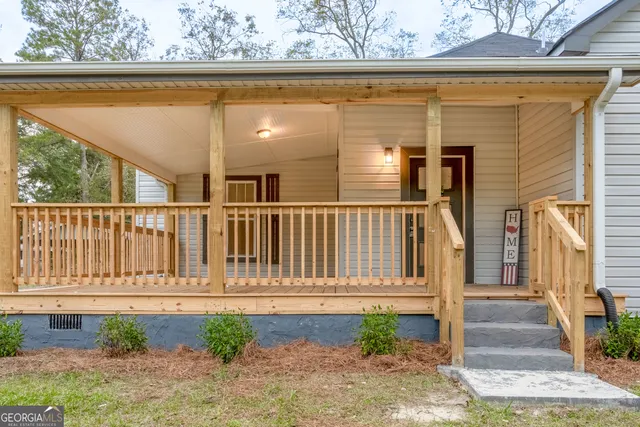 a house view with a garden