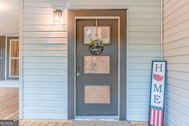 a view of a balcony with wooden floor