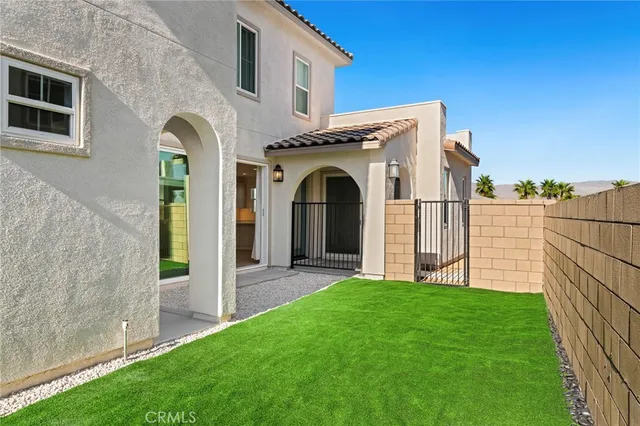 a view of a back yard of the house