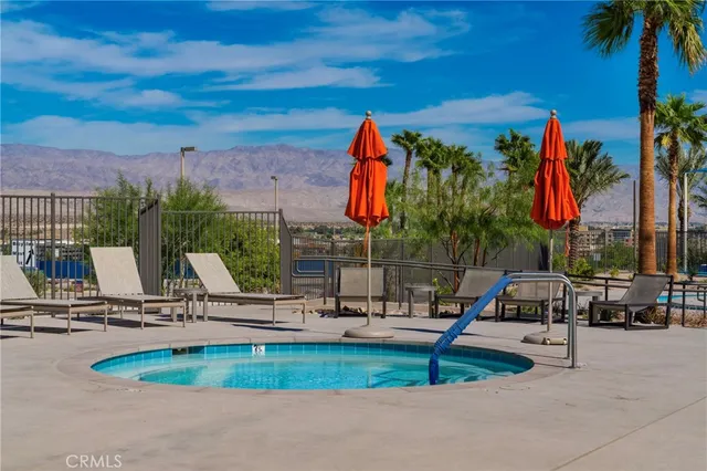 a view of a park with swings and slides