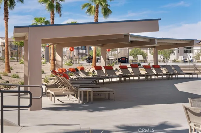 a room with lots of table and chairs