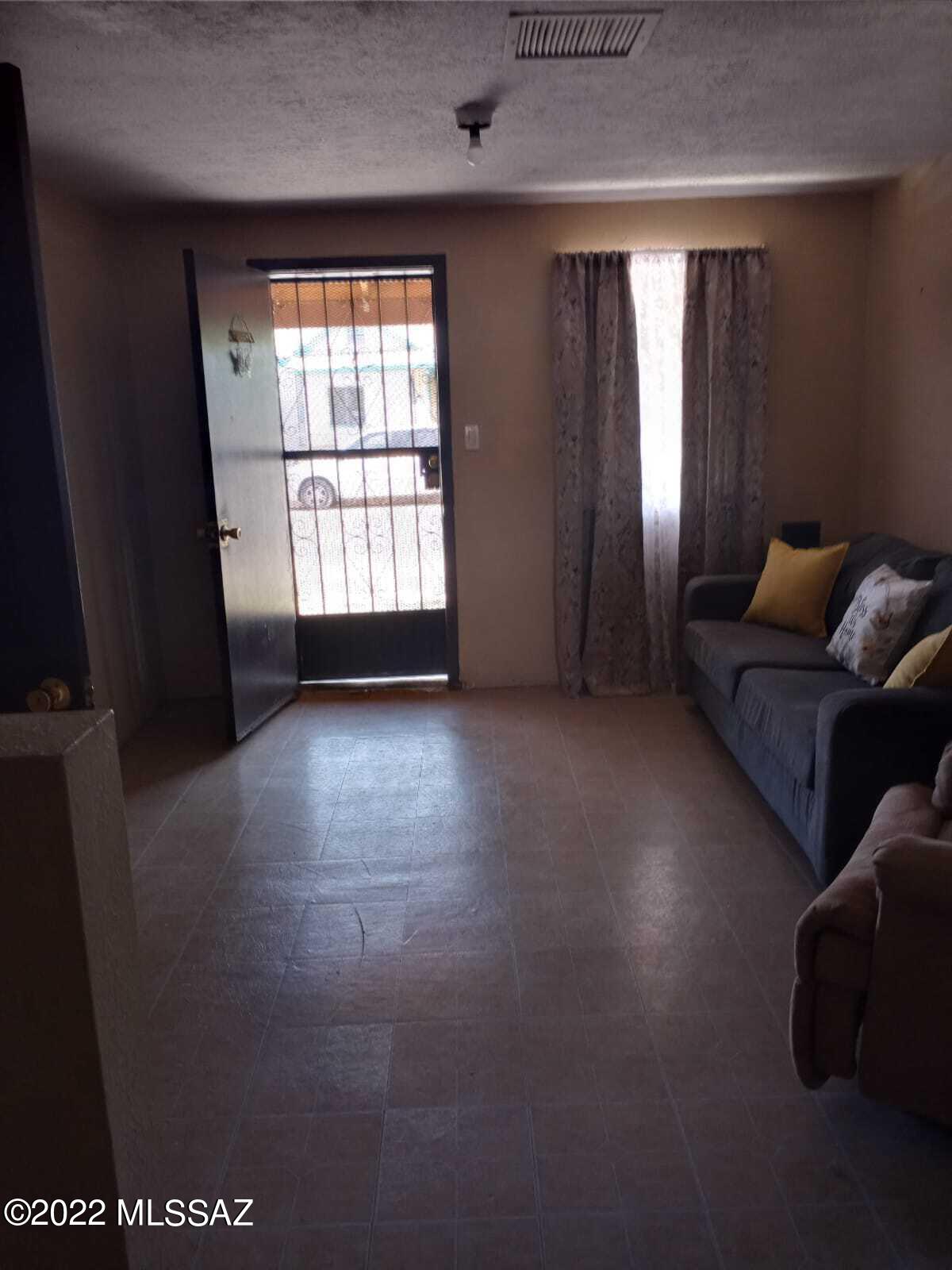 Undisclosed Address Douglas, AZ 85607 - Photo 11 of 16 a living room with furniture and a window