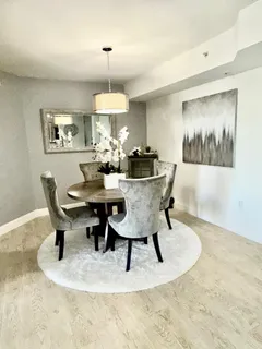a view of a dining room with furniture