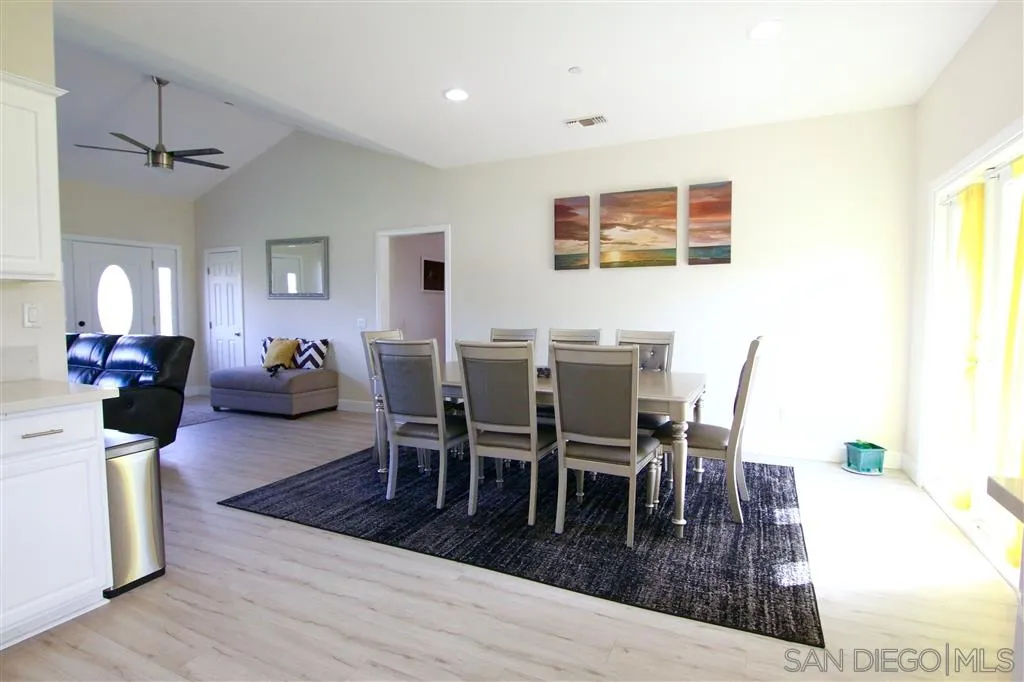 618 Steffy Road Ramona, CA 92065 - Photo 3 of 10 a view of a dining room with furniture and wooden floor