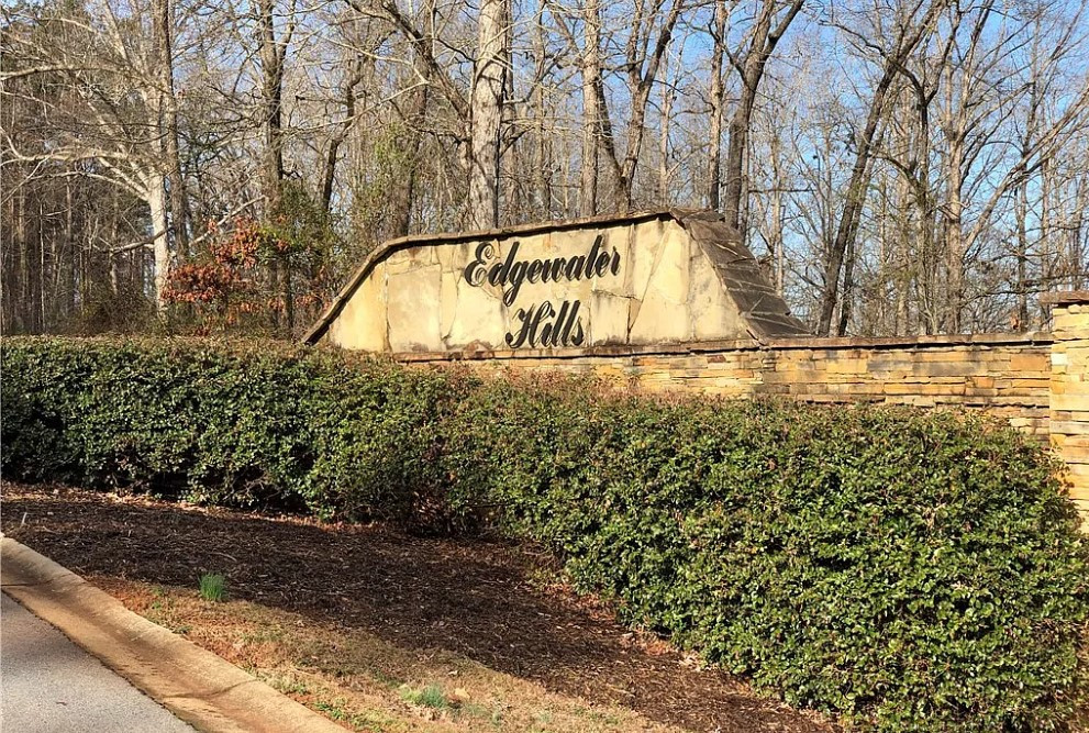 474 Overlook Drive Fair Play, SC 29643 - Photo 3 of 10 A stone entryway with lush landscaping welcomes residents to Edgewater Hills.