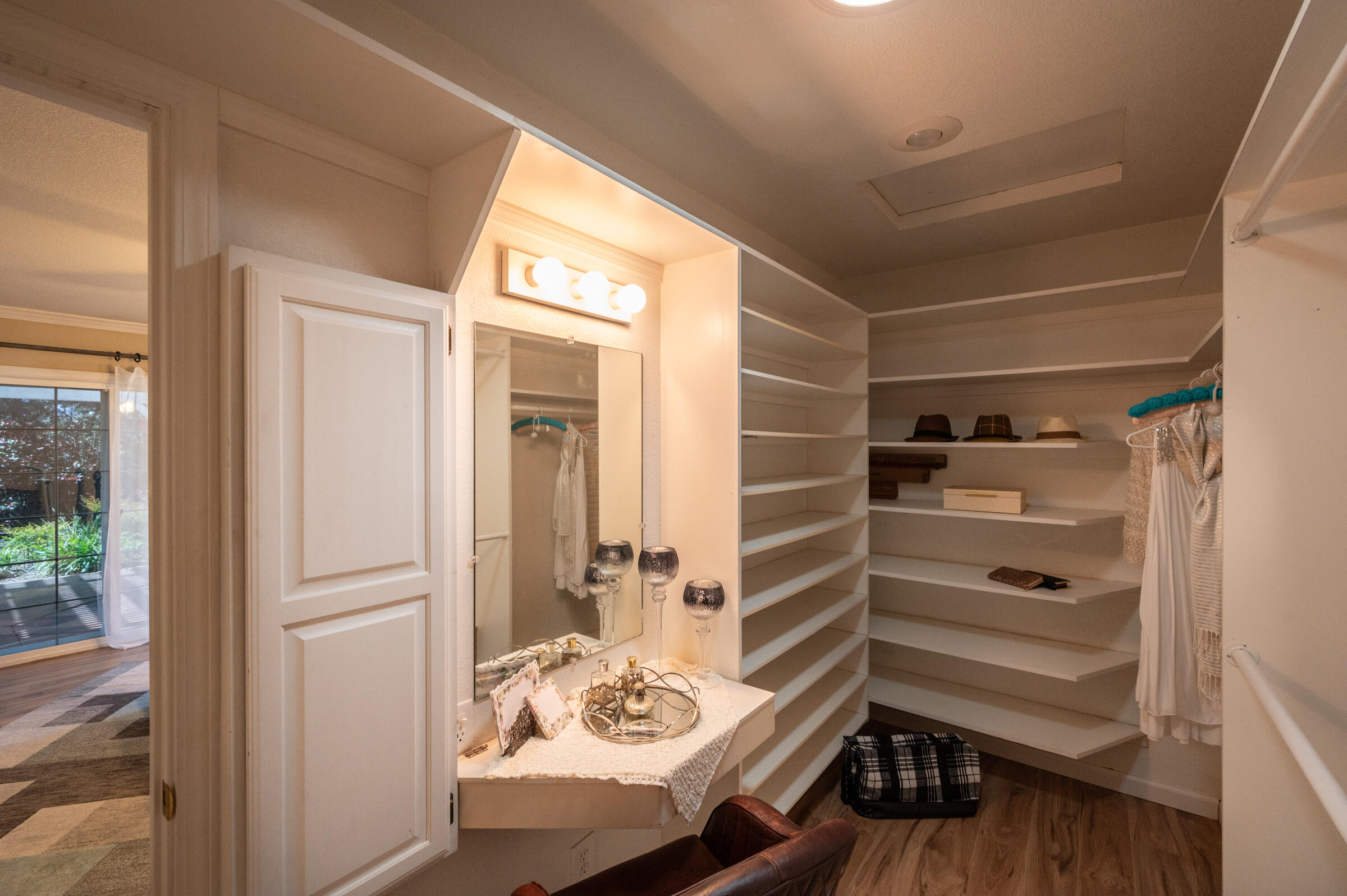 2885 Starlight Boulevard Redding, CA 96001 - Photo 17 of 51 a view of a bedroom with wooden floor and windows