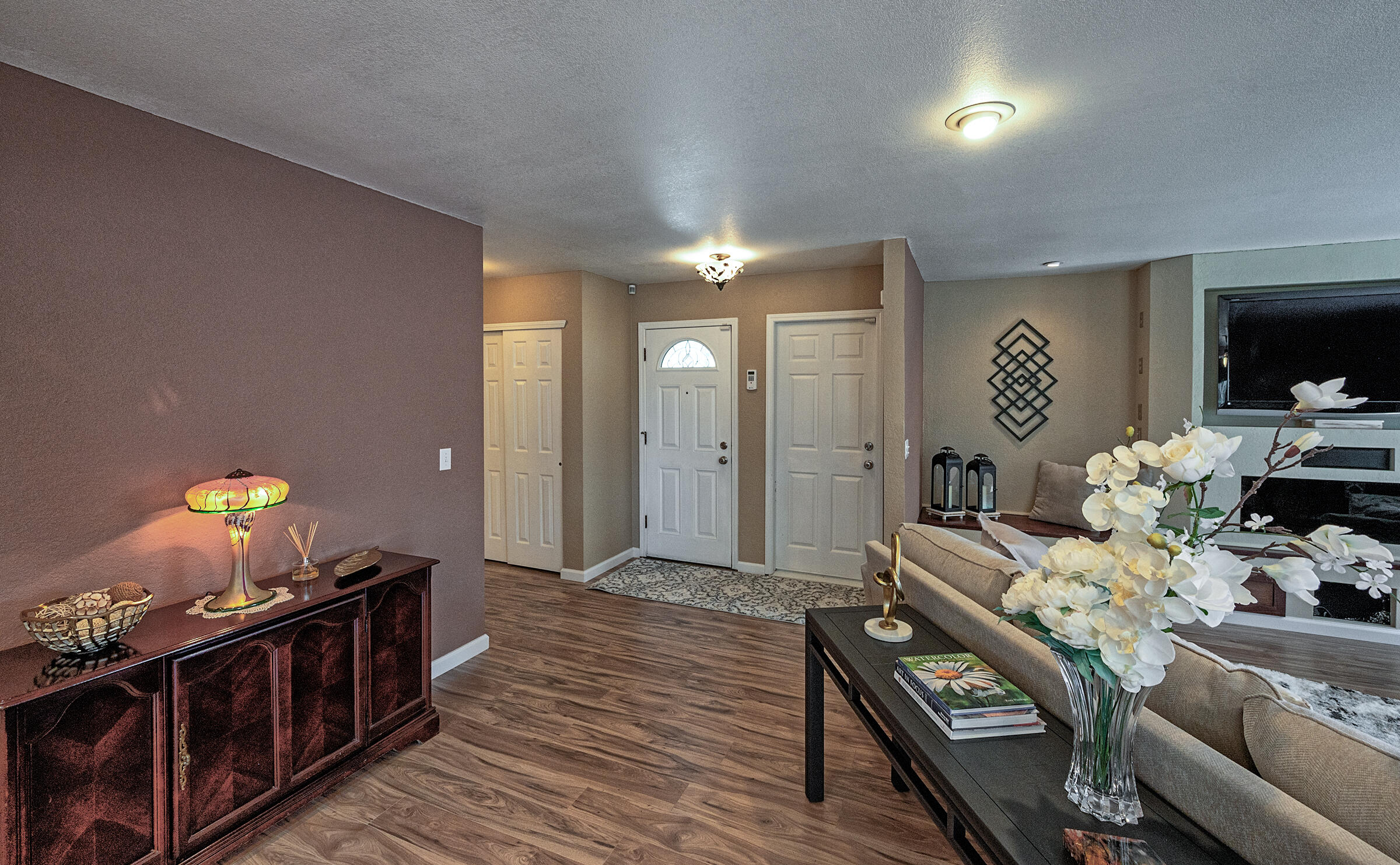 2885 Starlight Boulevard Redding, CA 96001 - Photo 4 of 51 a living room with furniture and a flat screen tv