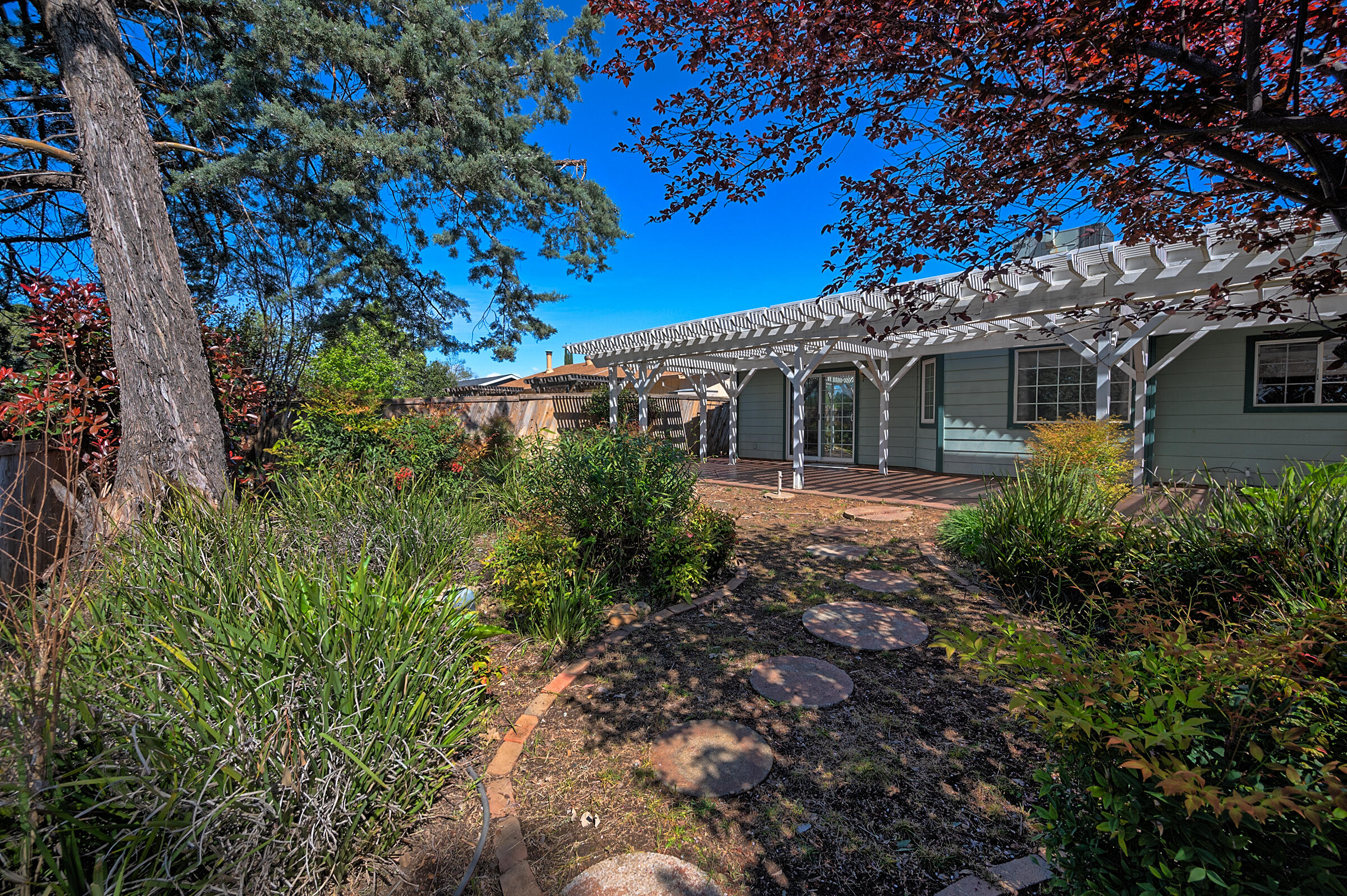 2885 Starlight Boulevard Redding, CA 96001 - Photo 45 of 51 a view of a house with a tree
