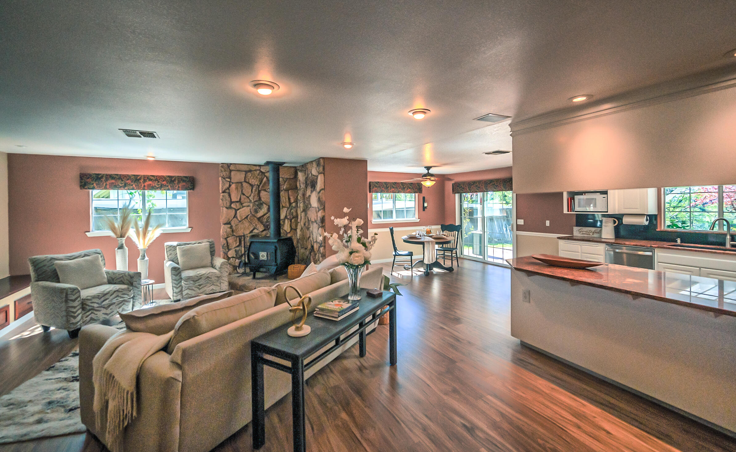 2885 Starlight Boulevard Redding, CA 96001 - Photo 6 of 51 a living room with furniture and a wooden floor