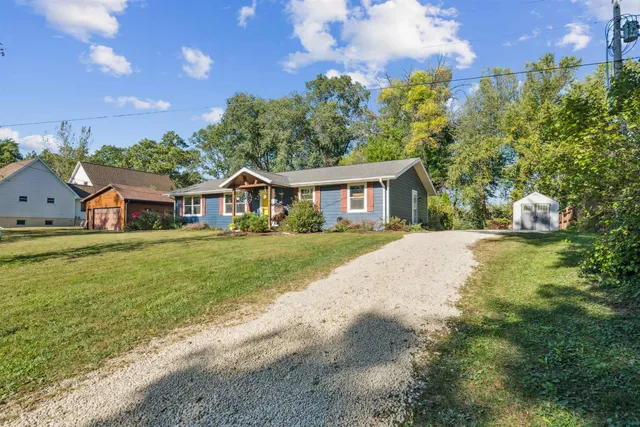 a house view with a garden space