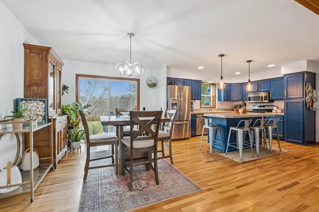 a bedroom with a bed and a desk