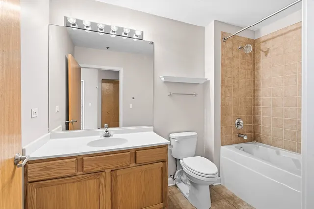 a bathroom with a sink a toilet and a bathtub