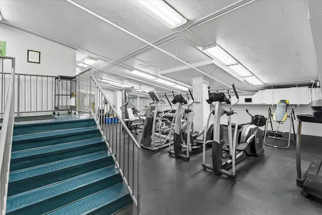 a view of a room with gym equipment