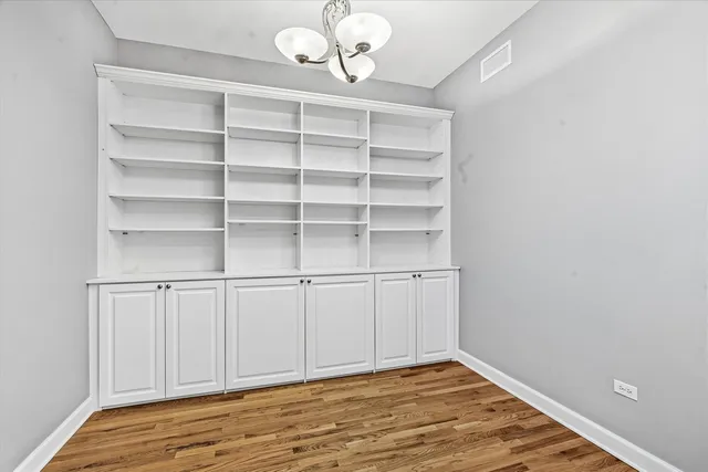 a view of empty room with empty racks