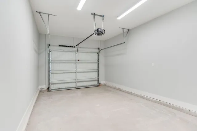 a view of room that has a wooden floor