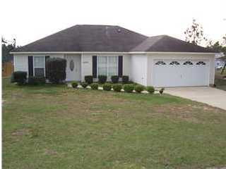 2829 Old Mill Way Crestview, FL 32539 - Photo 1 of 15 a front view of house with yard