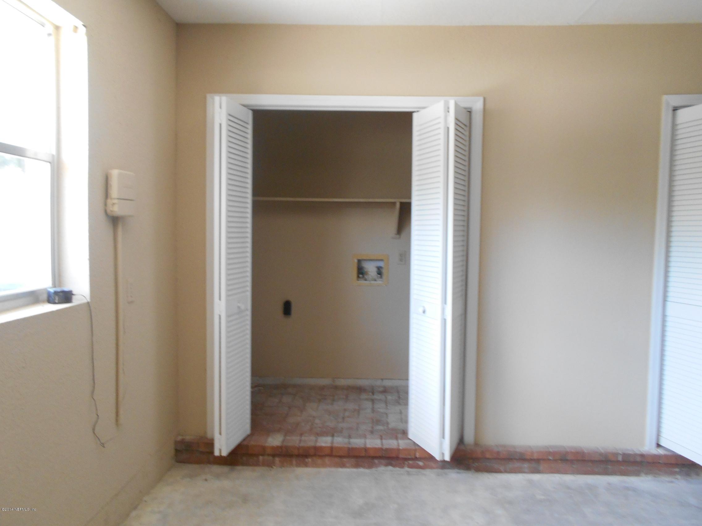 5190 Wembley Road Jacksonville, FL 32257 - Photo 15 of 23 Laundry area in Garage