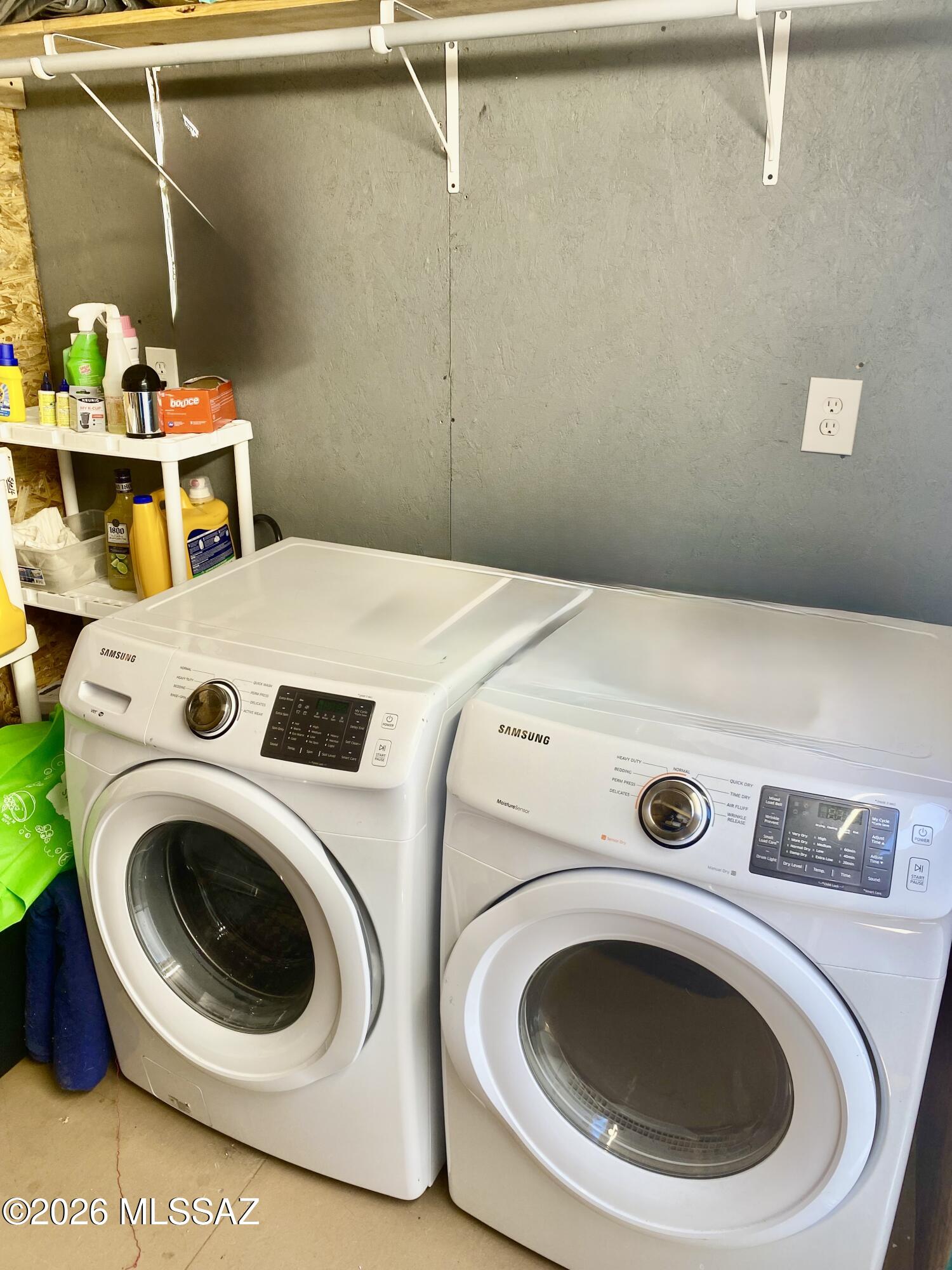 2843 19 Interstate 19 Frontage Road, Unit 116 Amado, AZ 85645 - Photo 25 of 32 a utility room with dryer and washer
