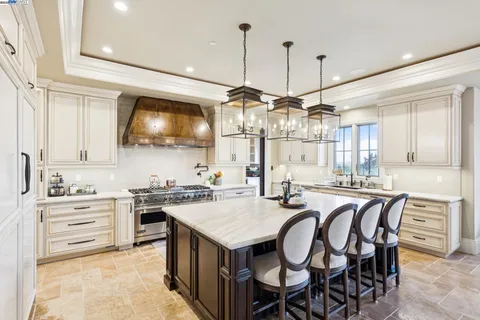 a view of room with window and a kitchen