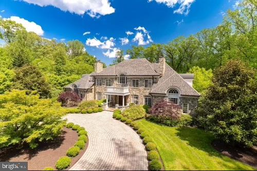 7712 Georgetown Pike McLean, VA 22102 - Photo 2 of 35 a view of a house with a swimming pool yard and outdoor seating