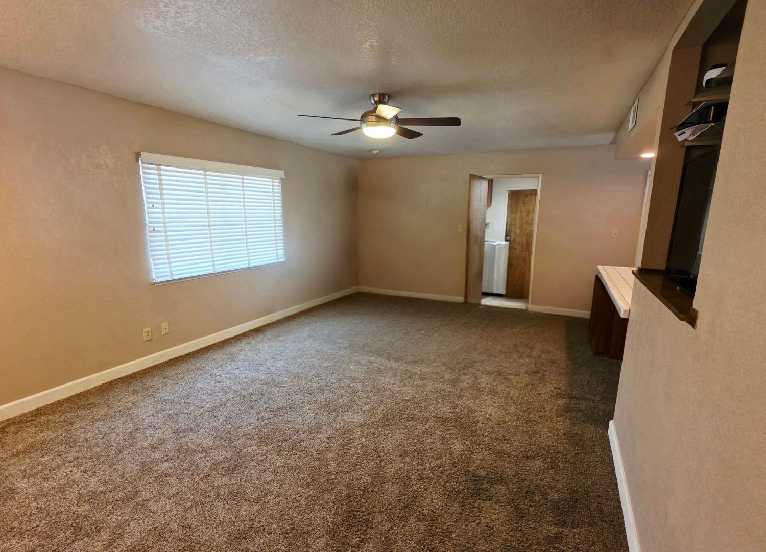 2214 Holt Avenue Sanger, CA 93657 - Photo 13 of 54 Family room off the left from the entryway