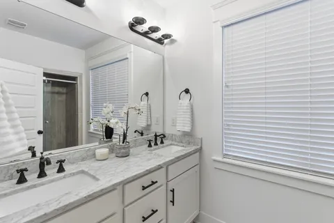 a bathroom with a shower and toilet