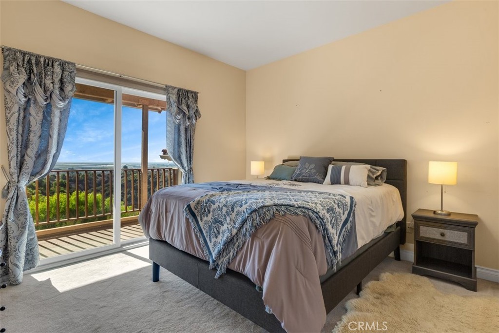 77 Altamont Way Camarillo, CA 93010 - Photo 18 of 48 a bedroom with a bed and a dresser next to a window