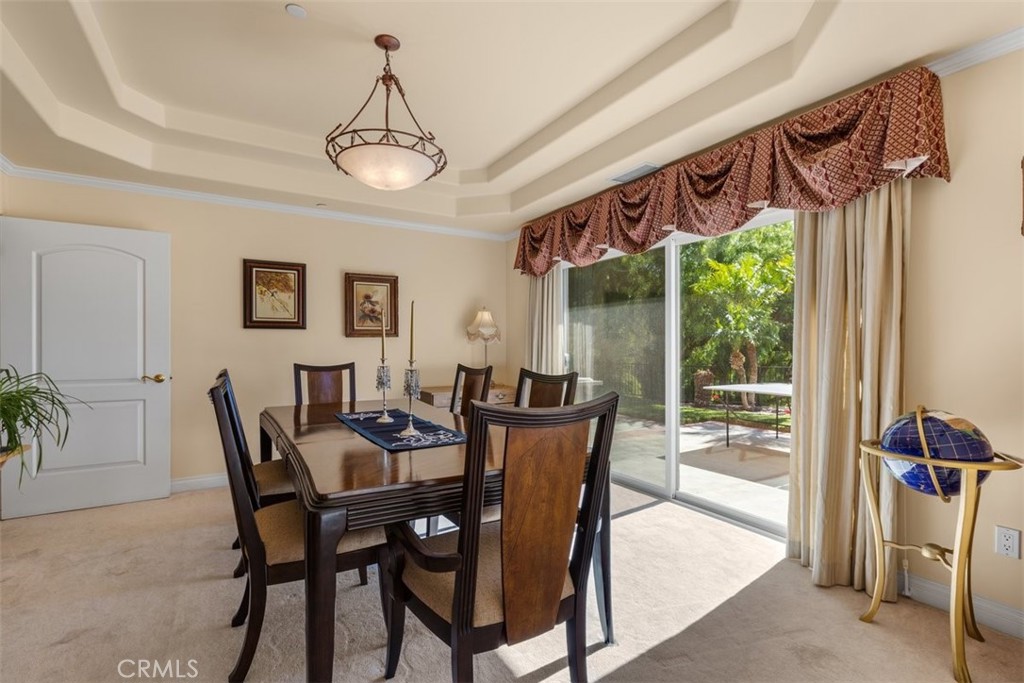77 Altamont Way Camarillo, CA 93010 - Photo 32 of 48 a dining room with furniture a chandelier and window