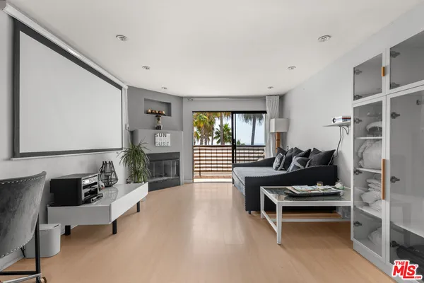 a view of a balcony with wooden floor