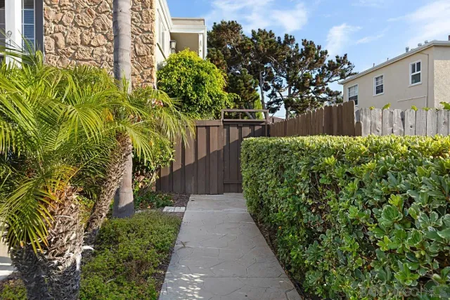 a front view of a house with yard