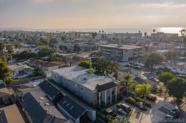 an aerial view of a city with lots of residential buildings
