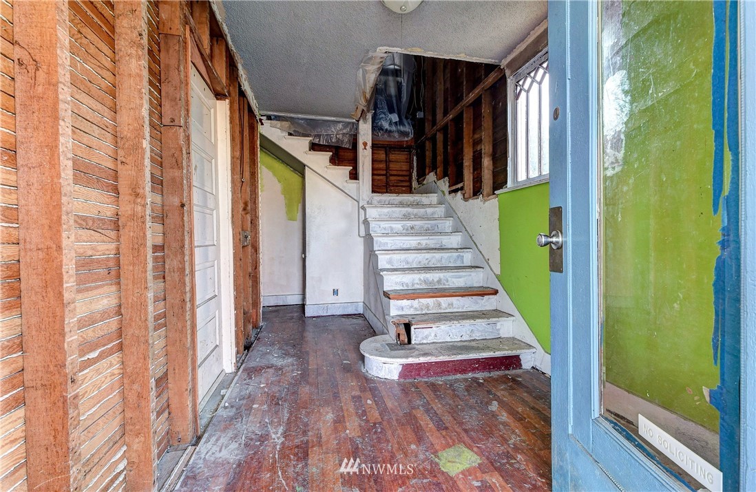 3618 Rucker Avenue Everett, WA 98201 - Photo 16 of 33 a view of entryway and hall with wooden floor