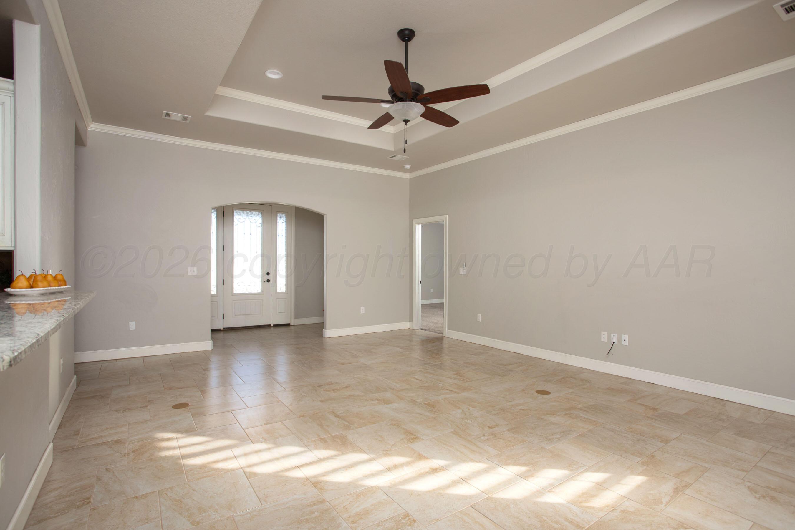 9551 Yesterday Lane Amarillo, TX 79119 - Photo 11 of 53 a view of an empty room with a window