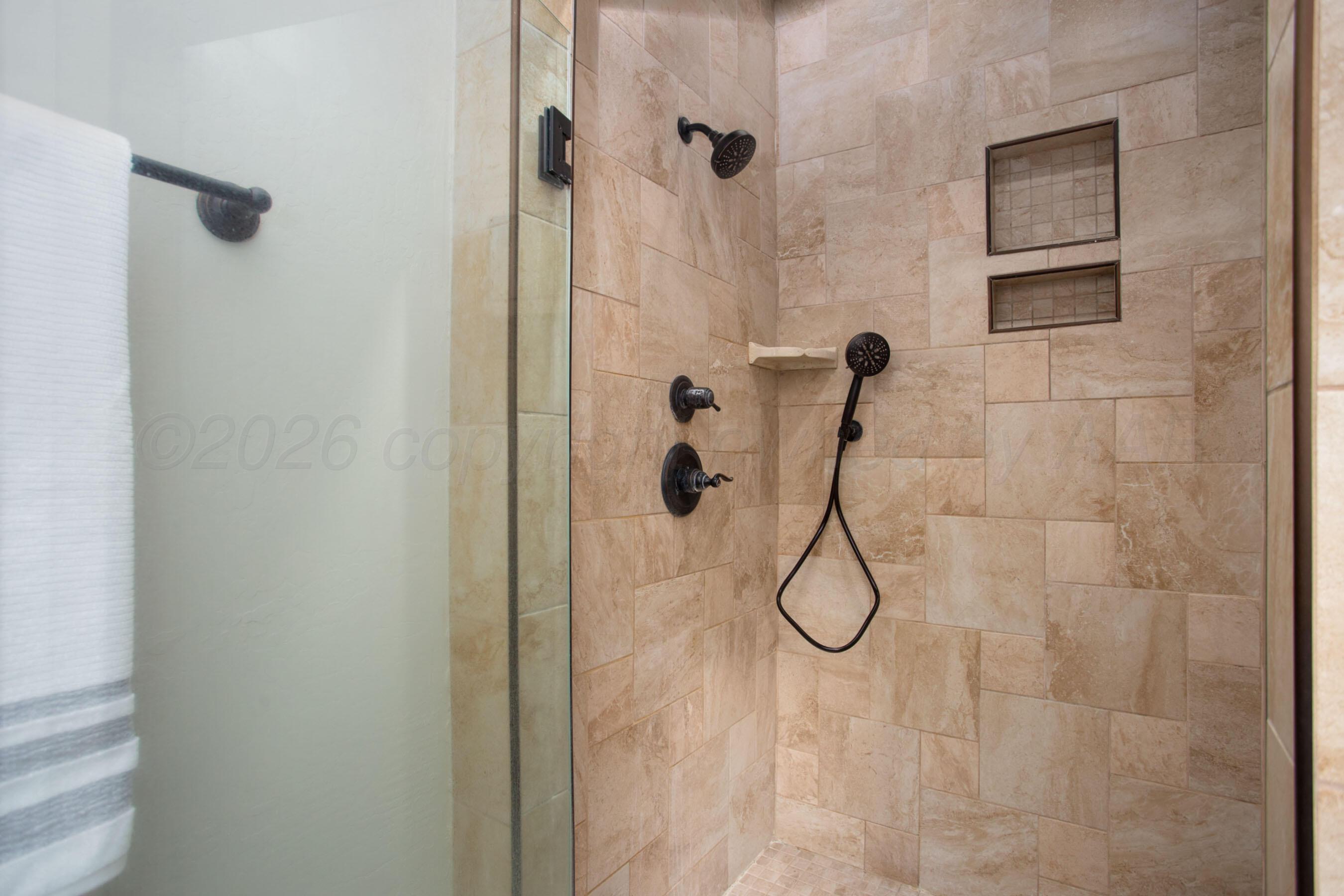 9551 Yesterday Lane Amarillo, TX 79119 - Photo 26 of 53 a bathroom that has a shower