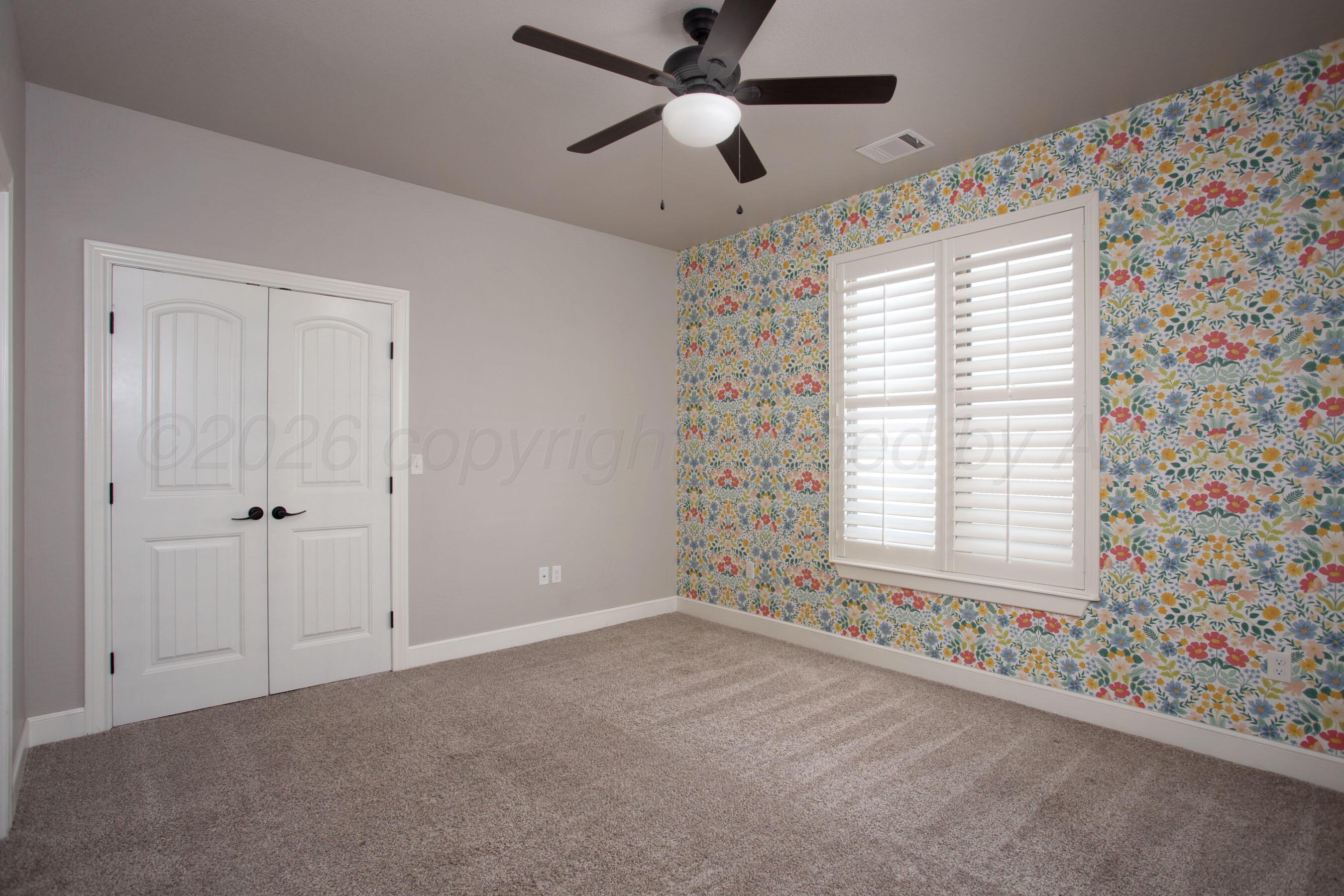 9551 Yesterday Lane Amarillo, TX 79119 - Photo 28 of 53 a view of an empty room with a window