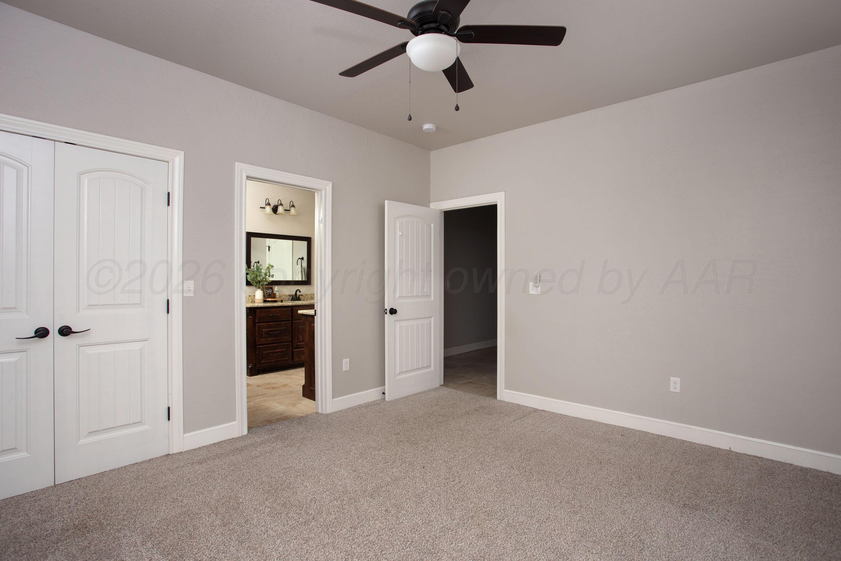 9551 Yesterday Lane Amarillo, TX 79119 - Photo 31 of 53 a view of an empty room and chandelier fan