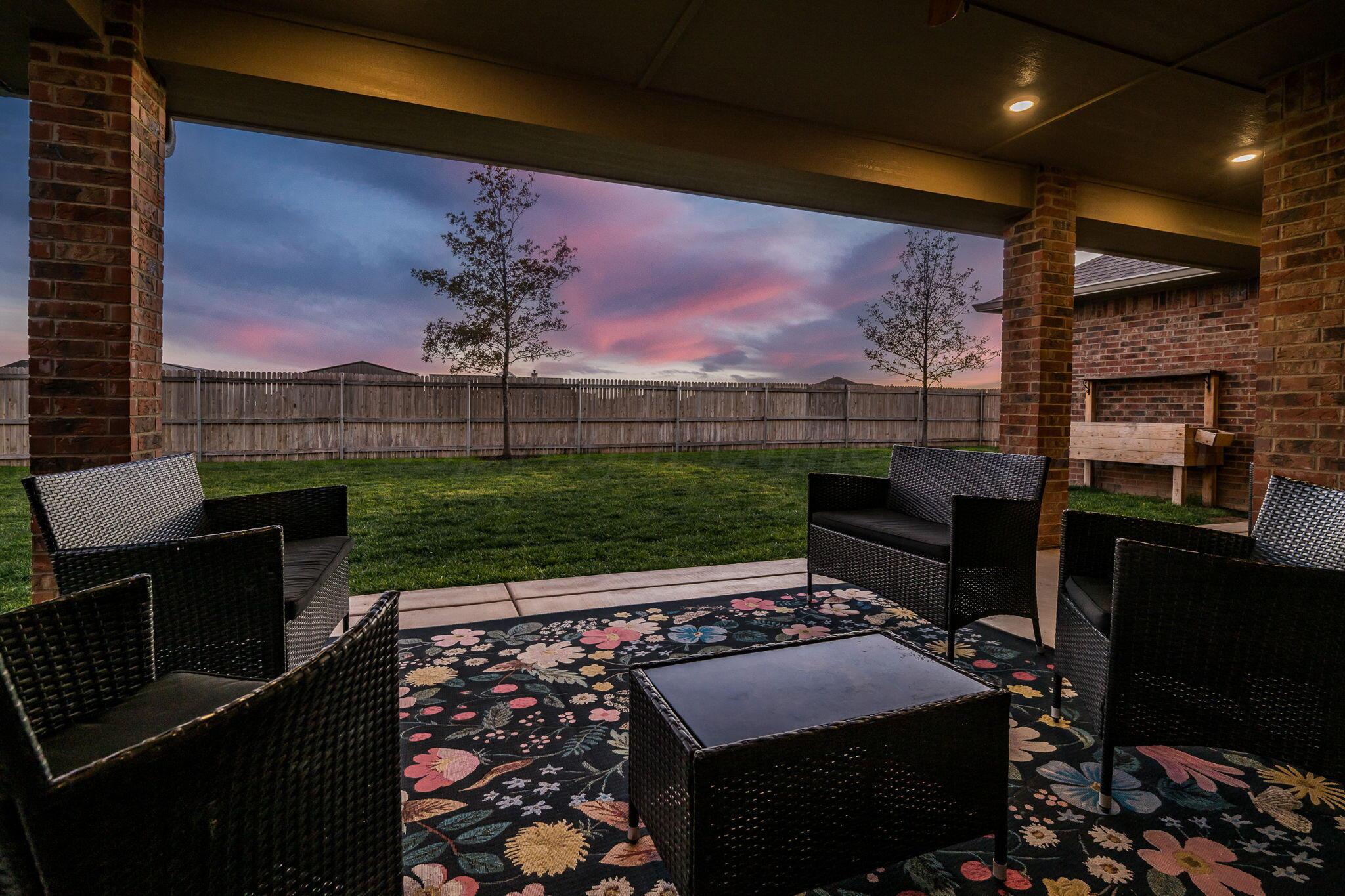 9551 Yesterday Lane Amarillo, TX 79119 - Photo 39 of 53 a view of a porch with furniture and a yard