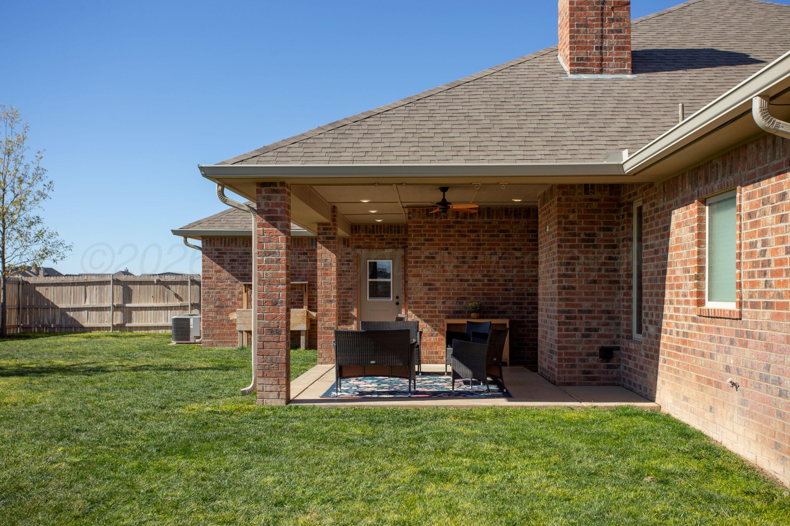 9551 Yesterday Lane Amarillo, TX 79119 - Photo 44 of 53 a view of a house with a backyard