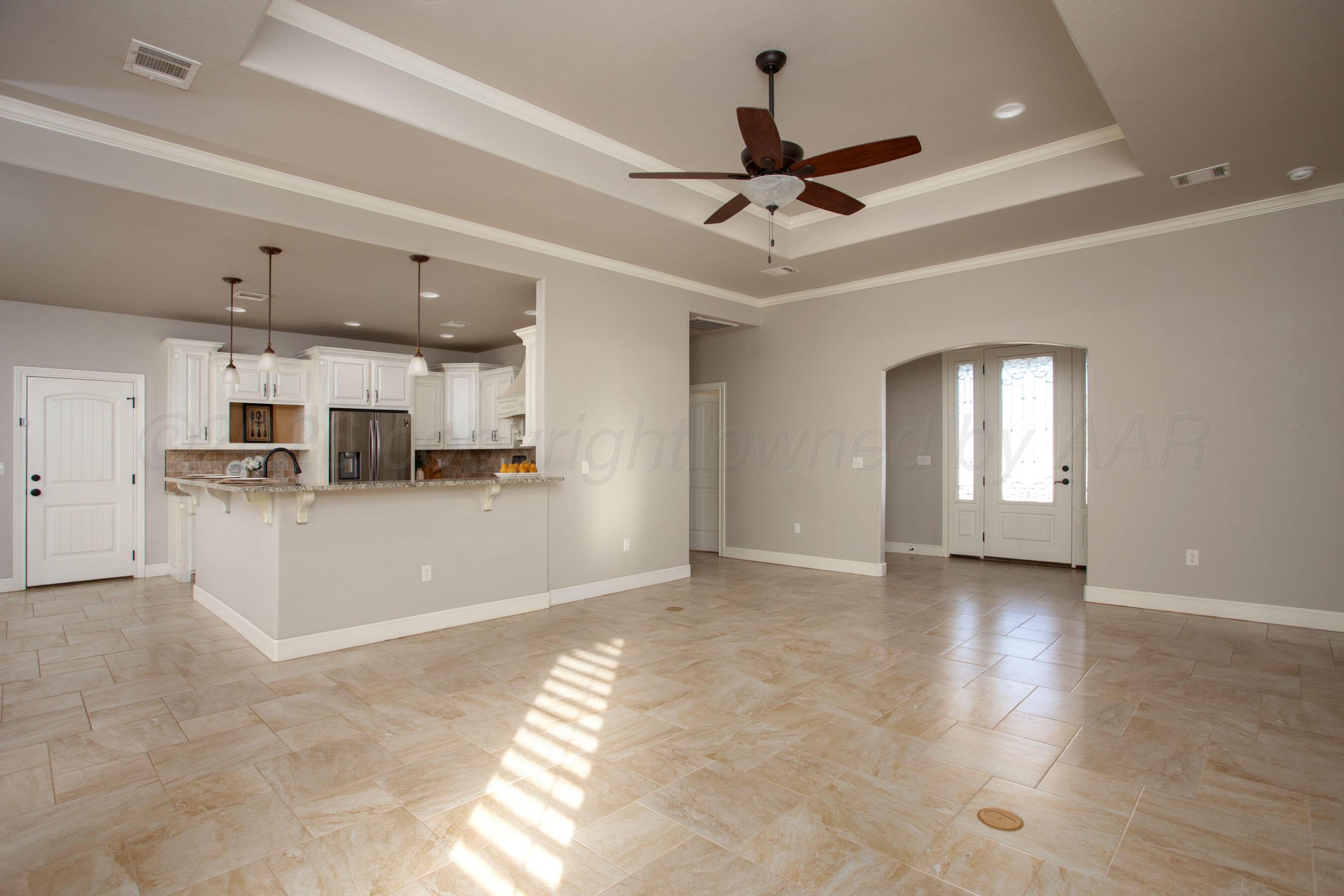 9551 Yesterday Lane Amarillo, TX 79119 - Photo 9 of 53 a view of a kitchen with a sink and a window