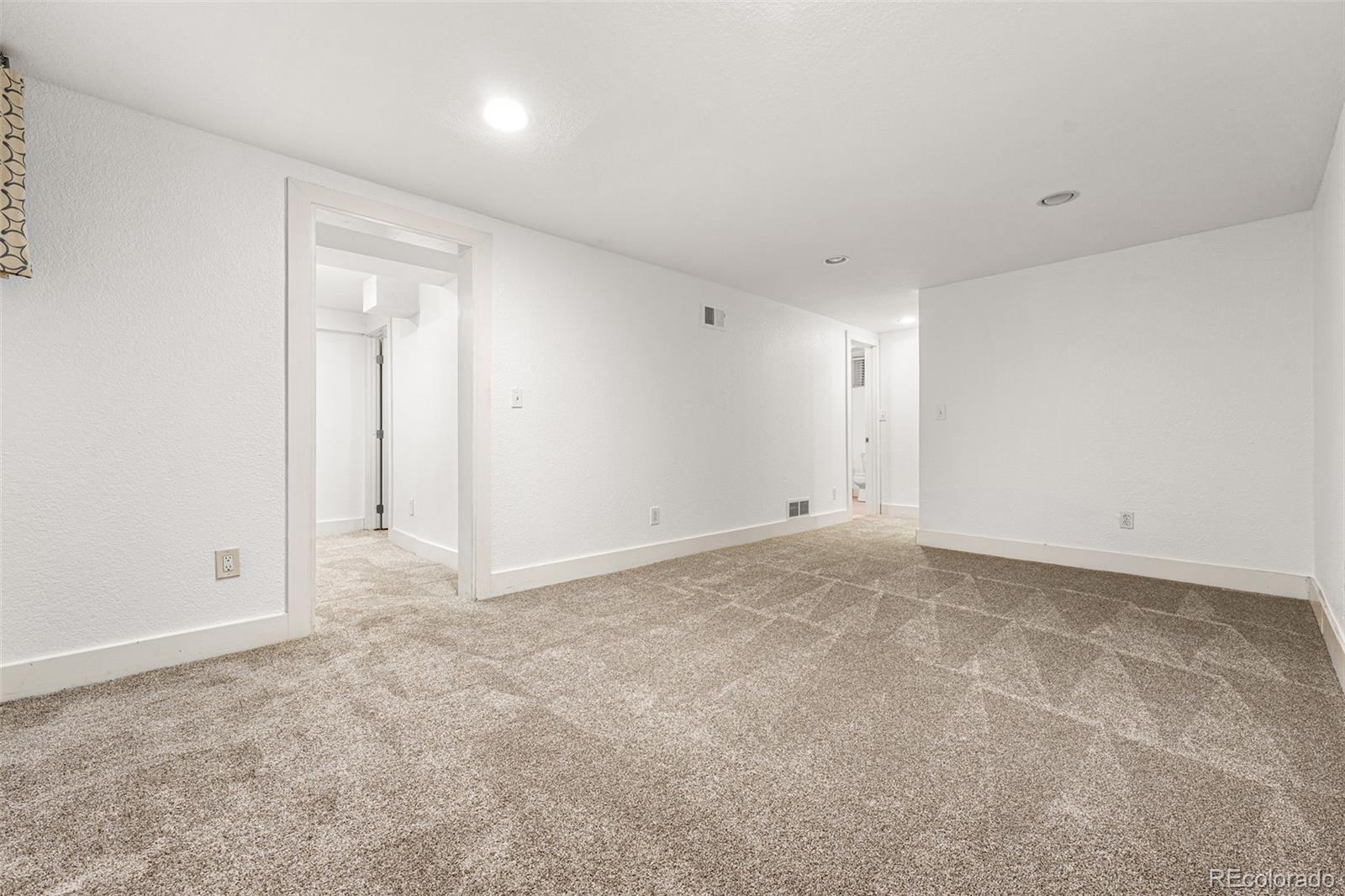 954 Jackson Street Denver, CO 80206 - Photo 19 of 37 a view of an empty room