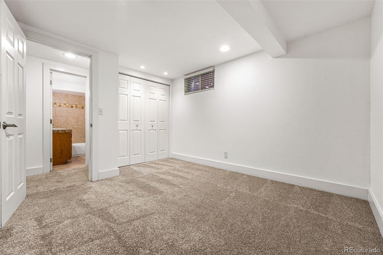 954 Jackson Street Denver, CO 80206 - Photo 21 of 37 an empty room with closet area