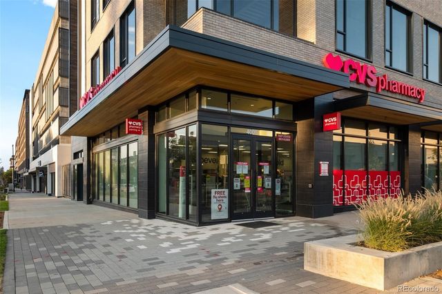 a view of street with shops