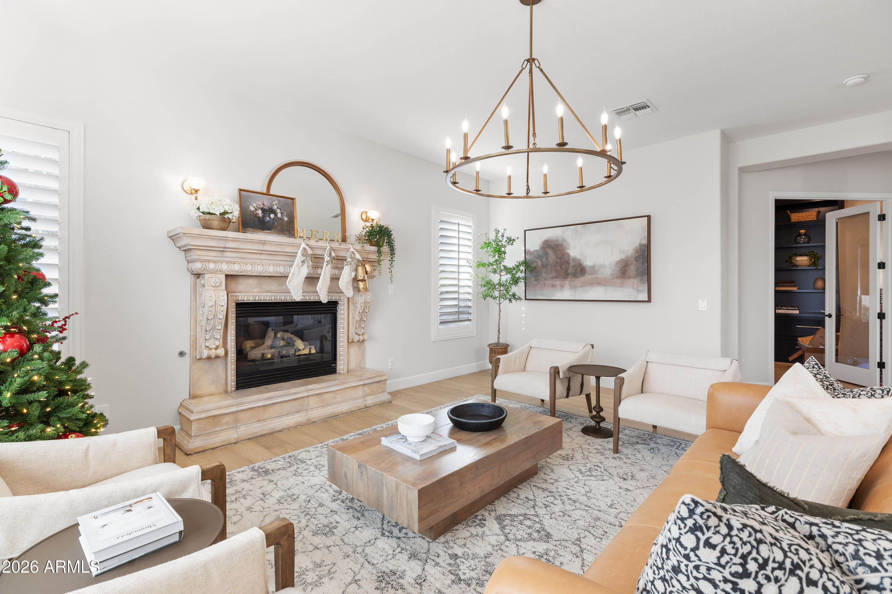 2517 South Constellation Way Gilbert, AZ 85295 - Photo 13 of 47 a living room with furniture and a fireplace