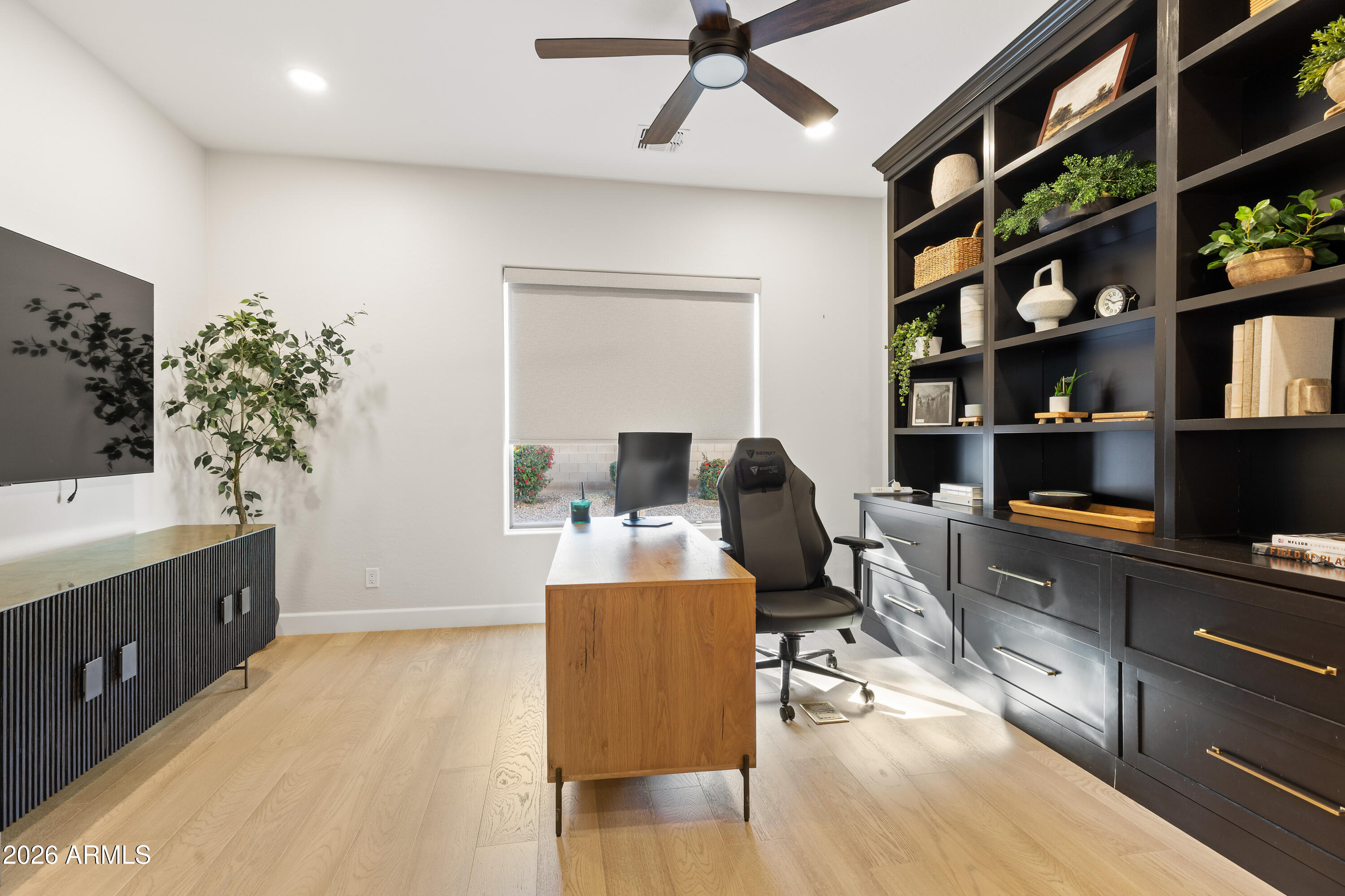 2517 South Constellation Way Gilbert, AZ 85295 - Photo 15 of 47 a workspace with furniture