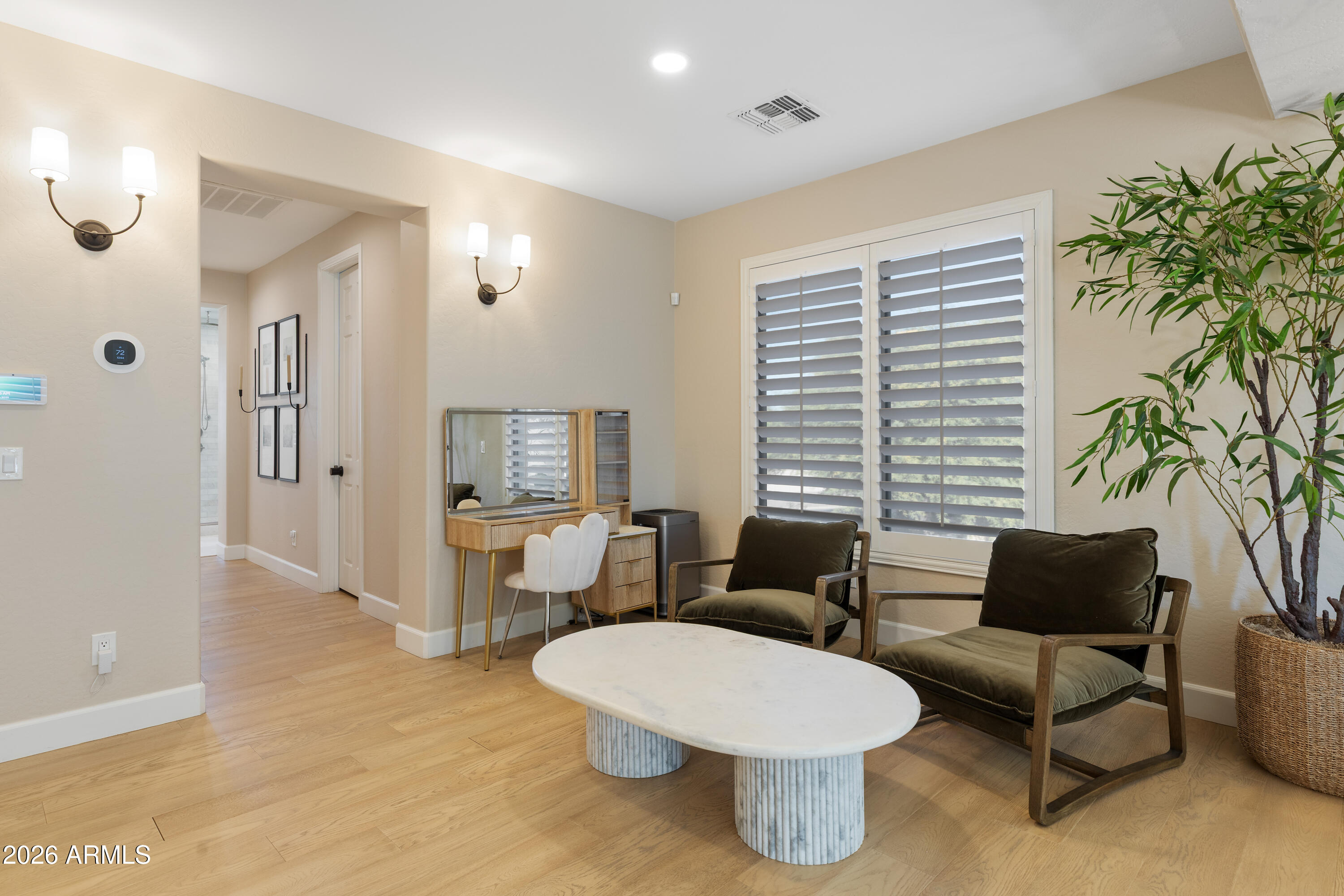 2517 South Constellation Way Gilbert, AZ 85295 - Photo 19 of 47 a living room with furniture and a large window