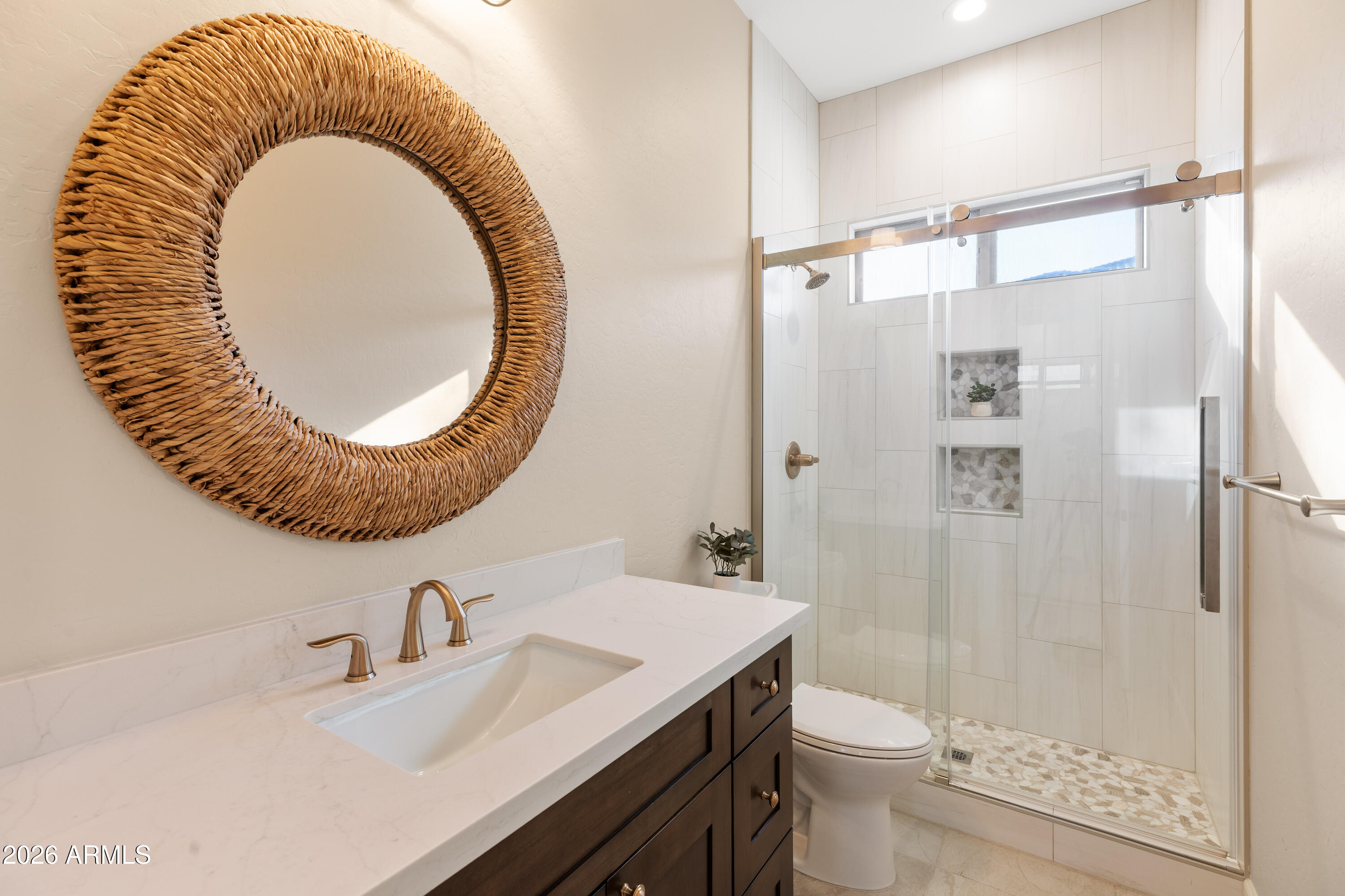 2517 South Constellation Way Gilbert, AZ 85295 - Photo 28 of 47 a bathroom with a sink and a mirror